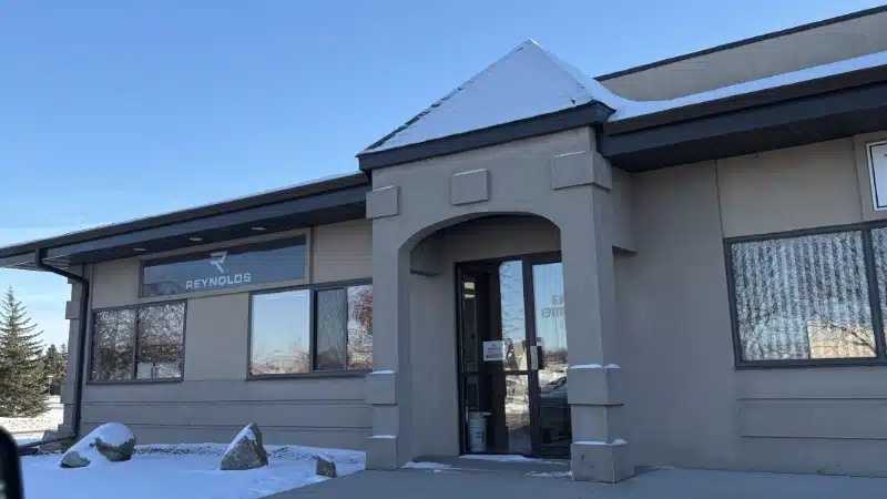 exterior front entrance view of clocktower plaza it hutchinson mn